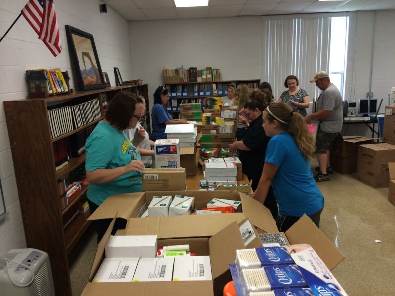 Classroom of people and boxes