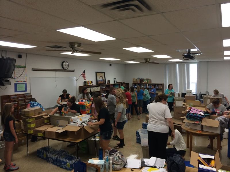 Classroom of people and boxes
